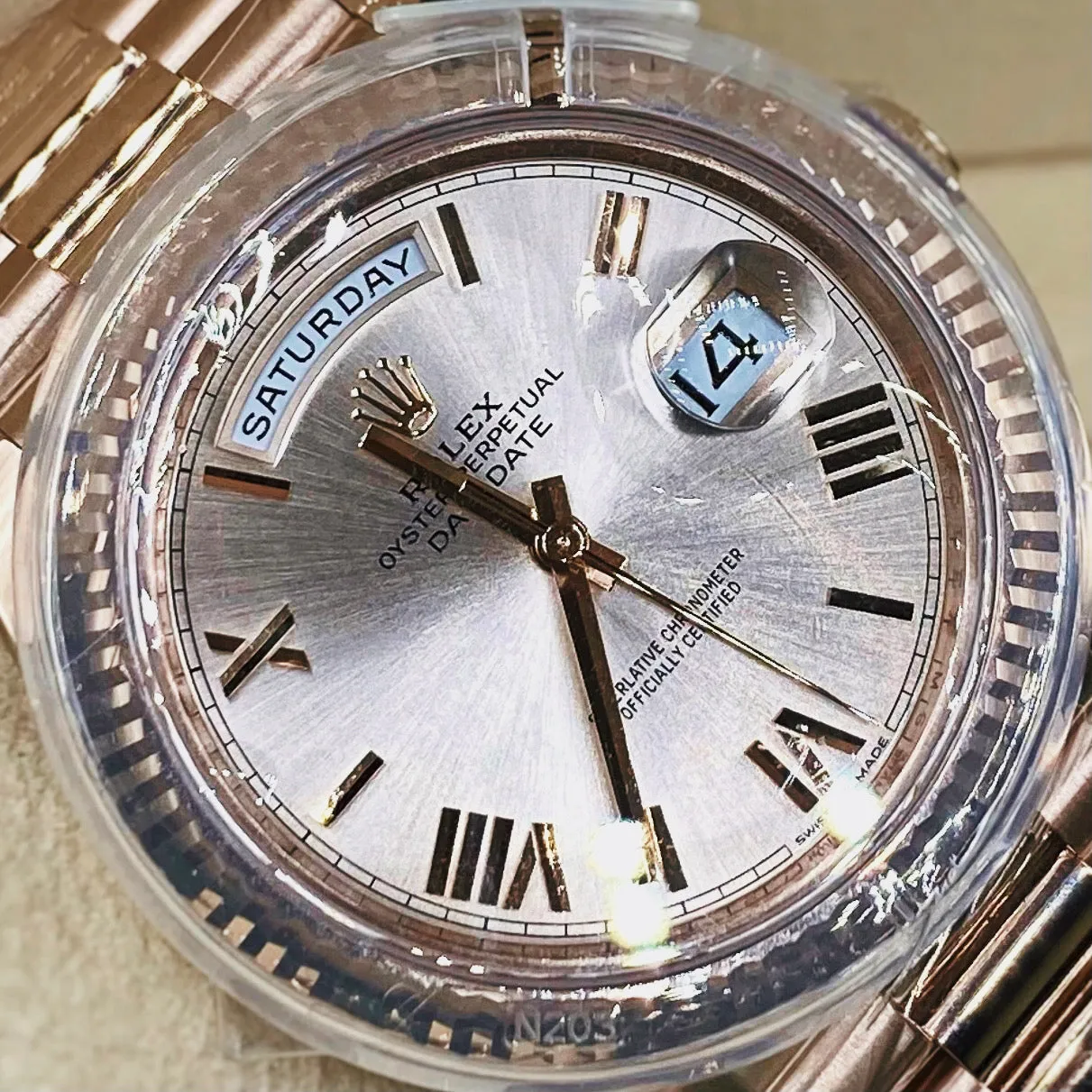 Rolex Day Date 40mm - Ref: 228235-0001 - Sundust Roman Dial & Fluted Bezel, 18K Rose Gold President Bracelet Men's Watch
